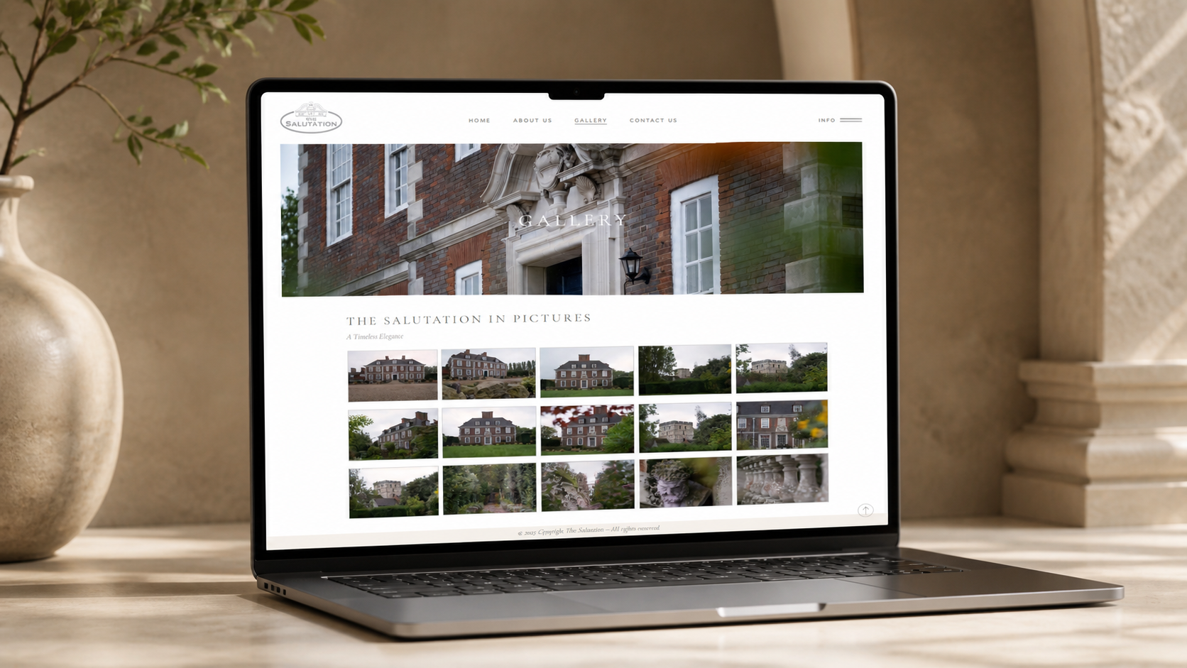 The Salutation Kent website Gallery page presented on a laptop in a styled setting